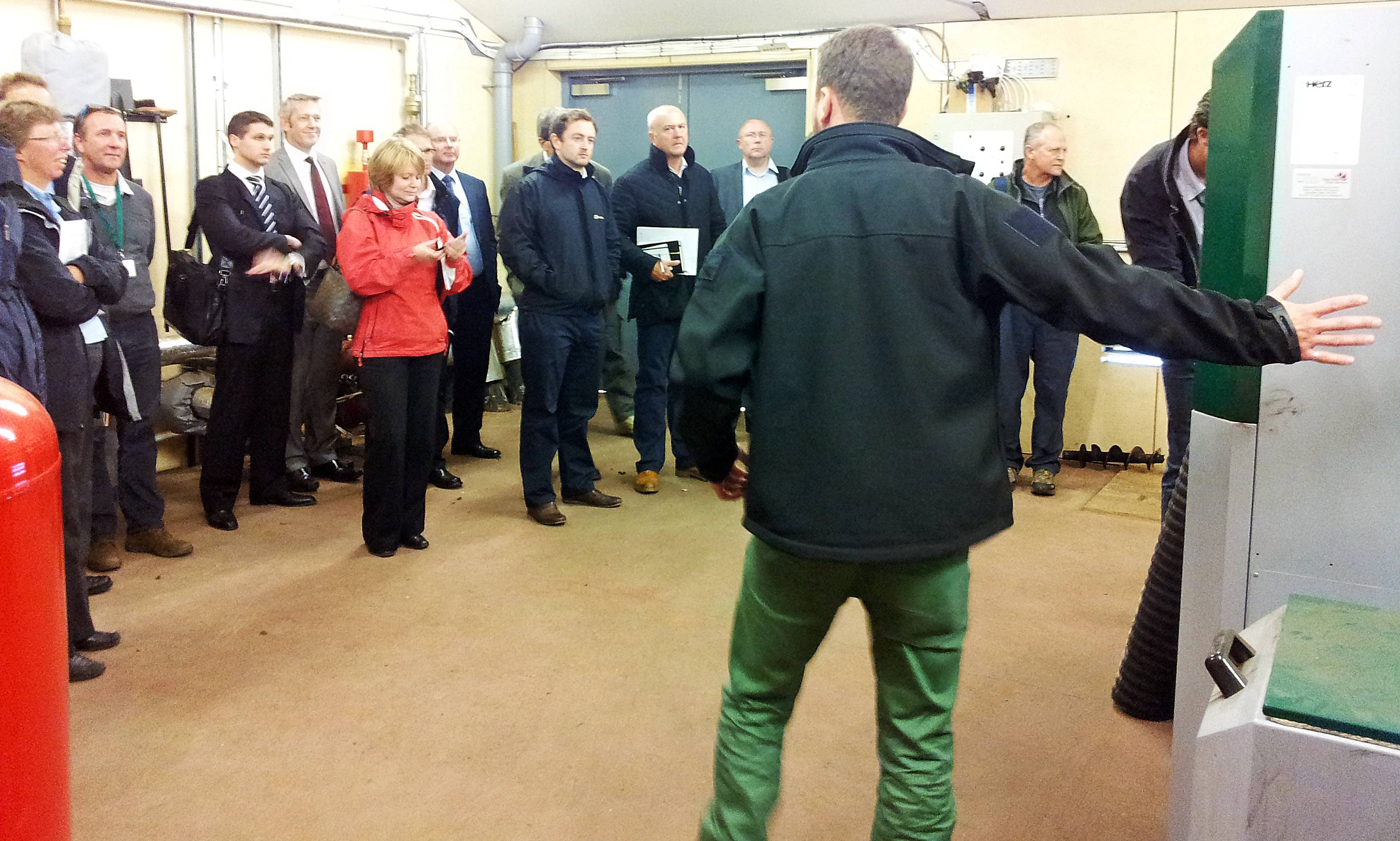 Delegates learn more about the Herz BioMatic biomass boiler in situ